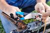 Man Using Channellock® 909 9.5 Inch Crimping Pliers